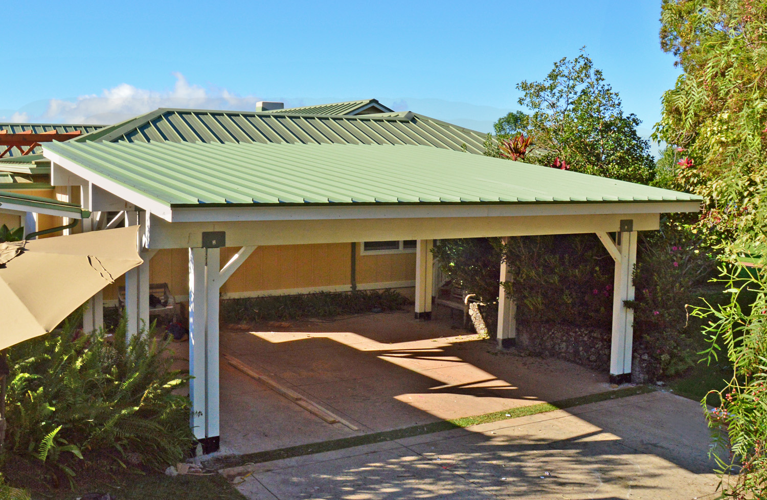 The roofing of this Carport Pavilion was selected to match the existing roofing of the home.