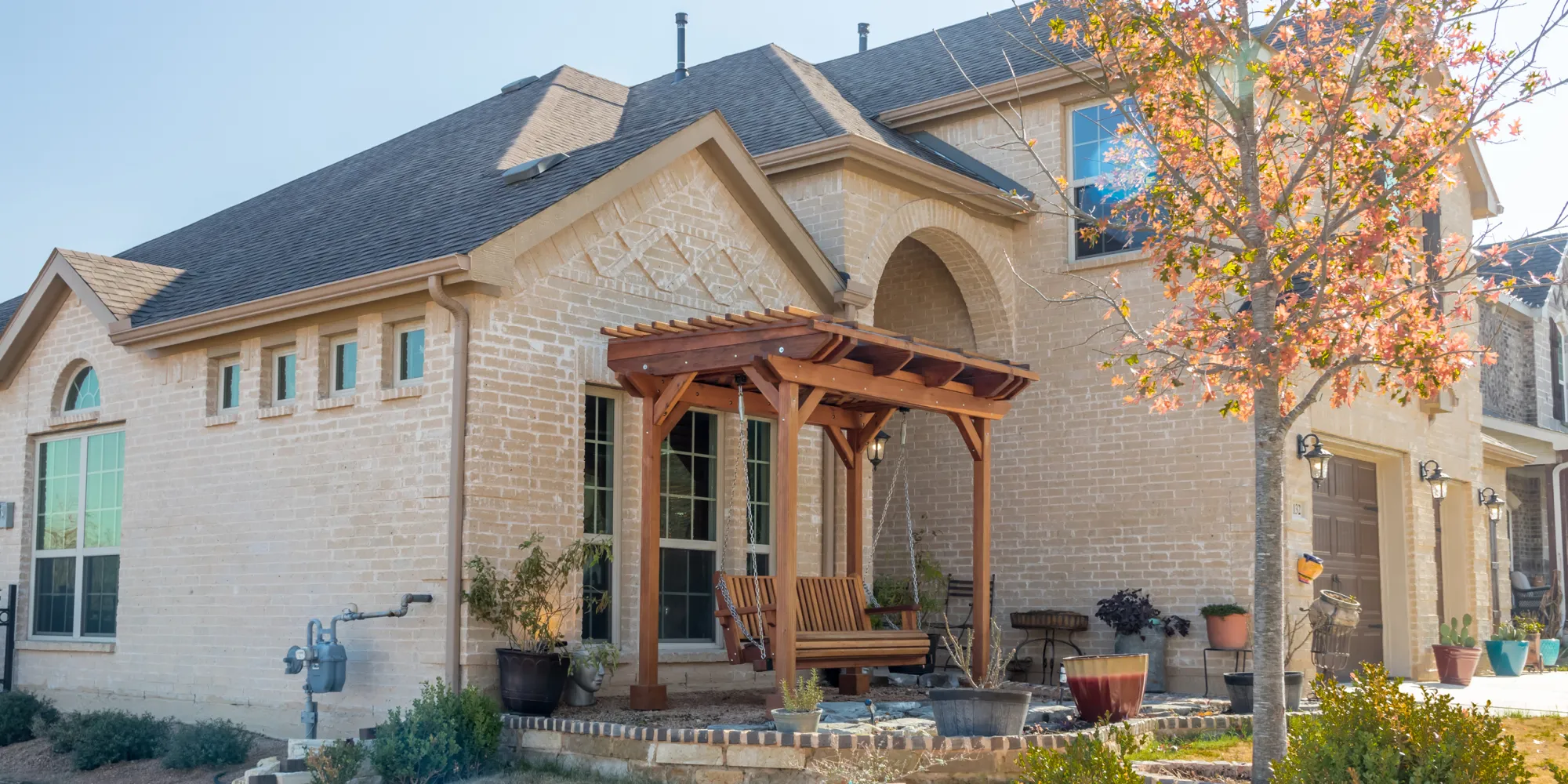 Angel's Trellis Swing, a redwood swing pergola at a customer's front door