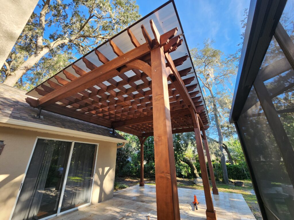 Pergola (with rainguard intact) after clean up is underway.