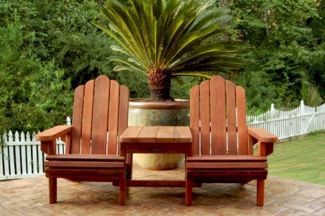Adirondack Chairs Joined by Thick Timbered Table