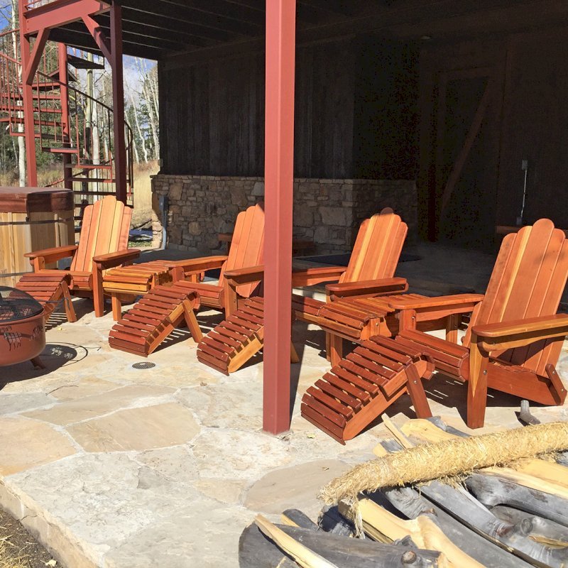 Adirondack Wooden Folding Chair (Options: California Redwood, Standard Depth, No Cushions, with Folding Ottomans, Transparent Premium Sealant). Photo Courtesy of P. Sigel of Telluride, Colorado. Adirondack Wooden Folding Chair (Options: California Redwood, Standard Depth, No Cushions, with Folding Ottomans, Transparent Premium Sealant). Photo Courtesy of P. Sigel of Telluride, Colorado.