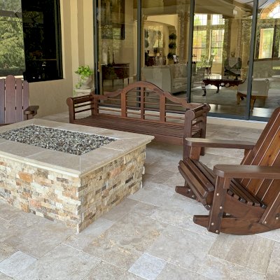Adirondack Wooden Rocking Chairs  (Options: Standard Size, Mature Redwood, No Cushion, No Ottoman, Coffee-Stain Premium Sealant). Photo Also Shows a 6' L Lutyens Bench. Photo Courtesy of B. Jones of Lakewood Ranch, Florida.