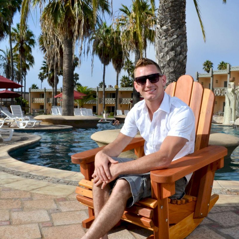Adirondack Wooden Rocking Chair (Options: Standard Width, California Redwood, No Cushion, No Ottoman, Transparent Premium Sealant). Photo Courtesy of The Estero Beach Resort, Ensenada, Mexico. Adirondack Wooden Rocking Chair (Options: Standard Width, California Redwood, No Cushion, No Ottoman, Transparent Premium Sealant). Photo Courtesy of The Estero Beach Resort, Ensenada, Mexico.