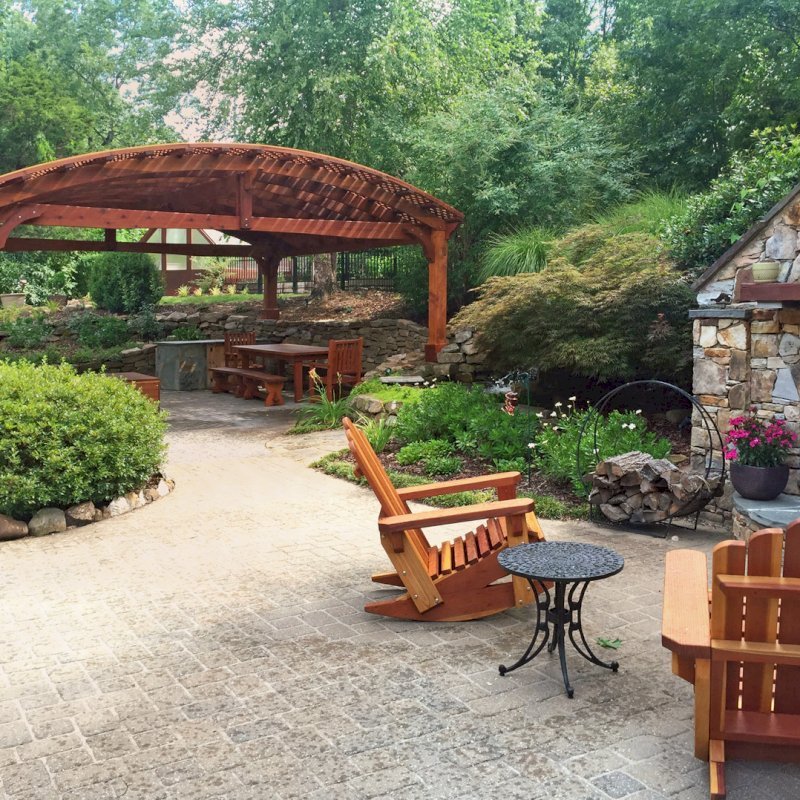 Adirondack Wooden Rocking Chair (Options: Standard Size, California Redwood, No Cushion, No Ottoman, Transparent Premium Sealant). Photo also shows a Viking Pergola and a San Francisco Patio Table set in the background. Photo Courtesy of Diego B. of Huntsville, AL. Adirondack Wooden Rocking Chair (Options: Standard Size, California Redwood, No Cushion, No Ottoman, Transparent Premium Sealant). Photo also shows a Viking Pergola and a San Francisco Patio Table set in the background. Photo Courtesy of Diego B. of Huntsville, AL.