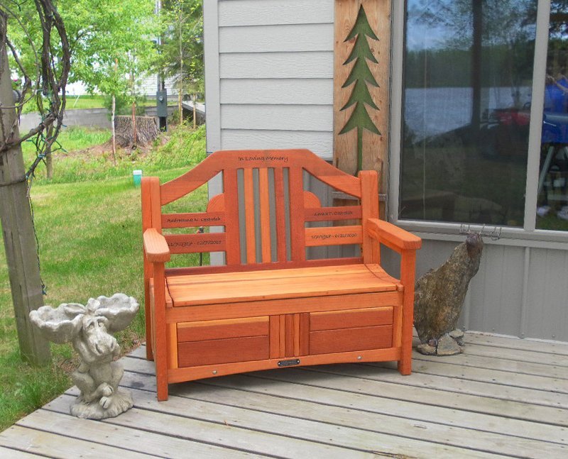 Alan's Redwood Storage Bench (Options: 4 ft, Add Pistons, California Redwood, No Cushions, Custom Engraving, Transparent Premium Sealant). Photo courtesy of Linda N. of Bovey, Minnesota. Alan's Redwood Storage Bench (Options: 4 ft, Add Pistons, California Redwood, No Cushions, Custom Engraving, Transparent Premium Sealant). Photo courtesy of Linda N. of Bovey, Minnesota.