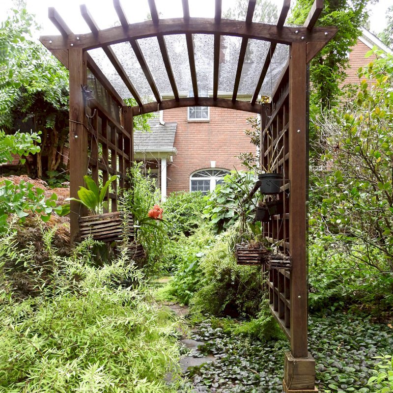 Arched Garden Arbor (Options: 48" W x 60" D, Mature Redwood, Anchor Kit for Concrete, Transparent Premium Sealant). Photo Courtesy of S. Fly of Millsboro, Delaware. Arched Garden Arbor (Options: 48" W x 60" D, Mature Redwood, Anchor Kit for Concrete, Transparent Premium Sealant). Photo Courtesy of S. Fly of Millsboro, Delaware.