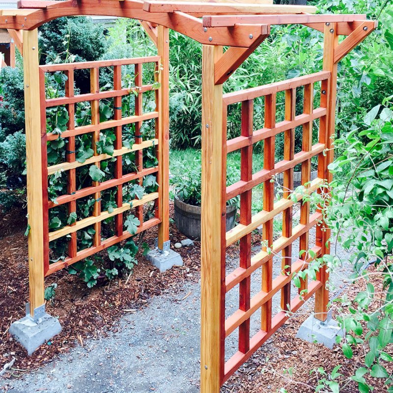 Arched Garden Arbor (Options: 48" W x 60" D, California Redwood, No Anchor Kit, Transparent Premium Sealant). Photo Courtesy of Evelyn and Dan Martin of Poulsbo, Washington. Arched Garden Arbor (Options: 48" W x 60" D, California Redwood, No Anchor Kit, Transparent Premium Sealant). Photo Courtesy of Evelyn and Dan Martin of Poulsbo, Washington.