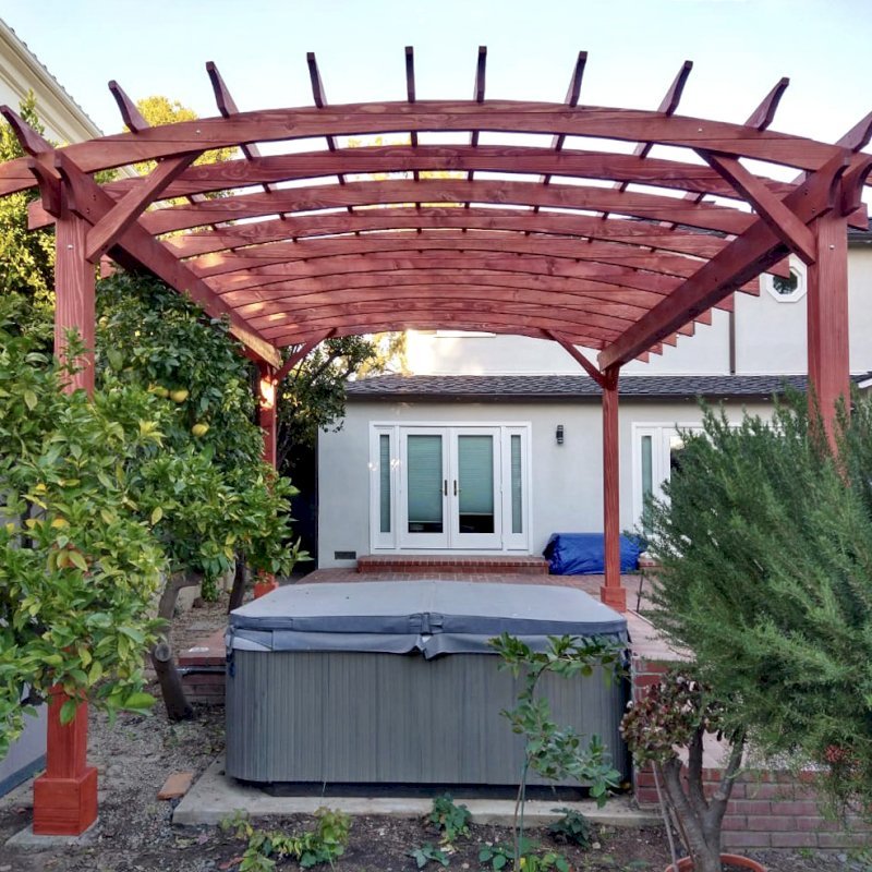 Arched Open Sky Pergolas (Options: 18' L x 15' Arc W, Douglas-fir, 2 Electrical Wiring Trims, 4 Post Anchor Kit for Concrete, No Ceiling Fan Base, No Privacy Panels, No Curtain Rods, 9' Post Height, Custom Stain). Photo Courtesy of K. Jefferson of Santa Monica, CA. Arched Open Sky Pergolas (Options: 18' L x 15' Arc W, Douglas-fir, 2 Electrical Wiring Trims, 4 Post Anchor Kit for Concrete, No Ceiling Fan Base, No Privacy Panels, No Curtain Rods, 9' Post Height, Custom Stain). Photo Courtesy of K. Jefferson of Santa Monica, CA.