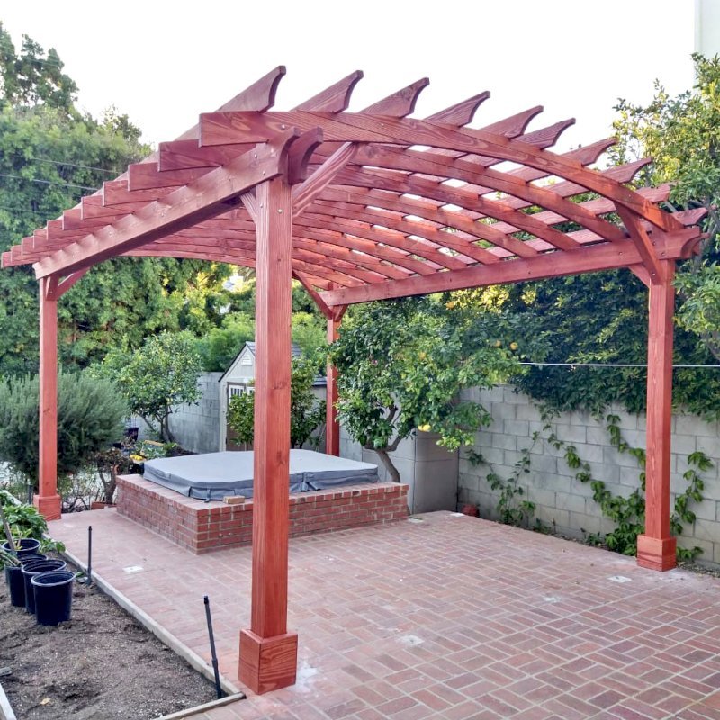 Arched Open Sky Pergolas (Options: 18' L x 15' Arc W, Douglas-fir, 2 Electrical Wiring Trims, 4 Post Anchor Kit for Concrete, No Ceiling Fan Base, No Privacy Panels, No Curtain Rods, 9' Post Height, Custom Stain). Photo Courtesy of K. Jefferson of Santa Monica, CA. Arched Open Sky Pergolas (Options: 18' L x 15' Arc W, Douglas-fir, 2 Electrical Wiring Trims, 4 Post Anchor Kit for Concrete, No Ceiling Fan Base, No Privacy Panels, No Curtain Rods, 9' Post Height, Custom Stain). Photo Courtesy of K. Jefferson of Santa Monica, CA.