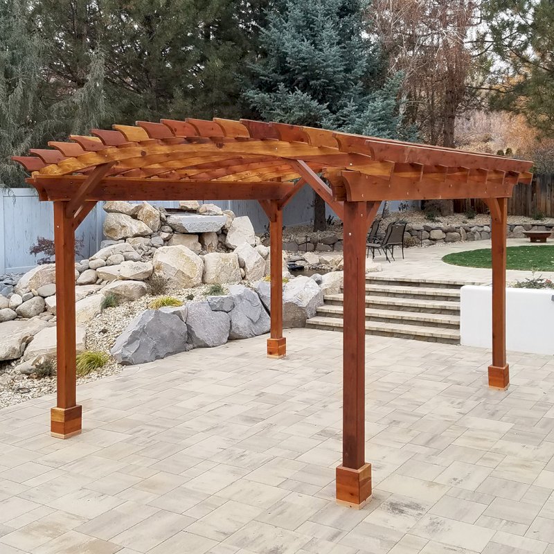 Arched Open Sky Pergolas (Options: 15' L x 14' Arc W, California Redwood, 1 Electrical Wiring Trim, 4 Post Anchor Kit for Hurricane, 1 Ceiling Fan Base, No Privacy Panels, No Curtain Rods, 9' Post Height, Transparent Premium Sealant). Photo Courtesy of D. Cozzi of Reno, Nevada. Arched Open Sky Pergolas (Options: 15' L x 14' Arc W, California Redwood, 1 Electrical Wiring Trim, 4 Post Anchor Kit for Hurricane, 1 Ceiling Fan Base, No Privacy Panels, No Curtain Rods, 9' Post Height, Transparent Premium Sealant). Photo Courtesy of D. Cozzi of Reno, Nevada.