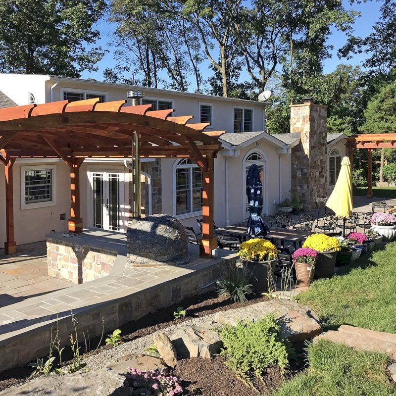 Arched Open Sky Pergolas (Options: 14' L x 12 Arc W & 24' L x 15' W, California Redwood, No Electrical Wiring Trim, No Decorative Trims on Posts, 4 Post Anchor Kit for Concrete, No Ceiling Fan Base, No Privacy Panels, No Curtain Rods, 9.5' Post Height, Transparent Premium Sealant). Photo Courtesy of M. Burke of BukleSomerset, NJ. Arched Open Sky Pergolas (Options: 14' L x 12 Arc W & 24' L x 15' W, California Redwood, No Electrical Wiring Trim, No Decorative Trims on Posts, 4 Post Anchor Kit for Concrete, No Ceiling Fan Base, No Privacy Panels, No Curtain Rods, 9.5' Post Height, Transparent Premium Sealant). Photo Courtesy of M. Burke of BukleSomerset, NJ.