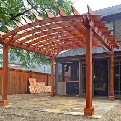 Arched Open Sky Pergolas (Options: 16' L x 12' Arc W, California Redwood, No Electrical Wiring Trim, Arched Roof with Lattice Panels, 4-Post Anchor Kit for Wood, No Ceiling Fan Base, with No Privacy Panels, No Curtain Rods, Transparent Premium Sealant). Photo Courtesy of B. McPherson of Billings, MT.