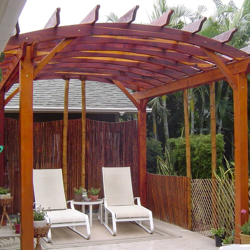 Arched Open Sky Pergolas (Options: 14' L x 12' Arc W, California Redwood, Unattached, No Electrical Wiring Trim, Arched Roof without Lattice Panels, 4 Post Anchor Kit for Stone, No Ceiling Fan Base, No Privacy Panels, No Curtain Rods, 9' Post Height, Transparent Premium Sealant). Photo courtesy of Jeff Bigler of Wailuku, HI. Arched Open Sky Pergolas (Options: 14' L x 12' Arc W, California Redwood, Unattached, No Electrical Wiring Trim, Arched Roof without Lattice Panels, 4 Post Anchor Kit for Stone, No Ceiling Fan Base, No Privacy Panels, No Curtain Rods, 9' Post Height, Transparent Premium Sealant). Photo courtesy of Jeff Bigler of Wailuku, HI.