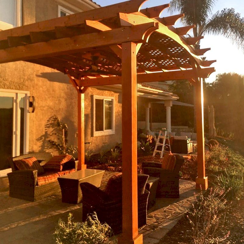 Arched Pergola Kit (Options: 14' L x 14' Arc W, Douglas-fir, 1 Electrical Wiring Trim Kits, 4 Post Anchor Kit for Concrete, 1 Ceiling Fan Bases, No Privacy Panels, No Curtain Rods, 9.5' Post Height, Transparent Premium Sealant). Photo Courtesy of D. Bissember of Escondido, CA. Arched Pergola Kit (Options: 14' L x 14' Arc W, Douglas-fir, 1 Electrical Wiring Trim Kits, 4 Post Anchor Kit for Concrete, 1 Ceiling Fan Bases, No Privacy Panels, No Curtain Rods, 9.5' Post Height, Transparent Premium Sealant). Photo Courtesy of D. Bissember of Escondido, CA.