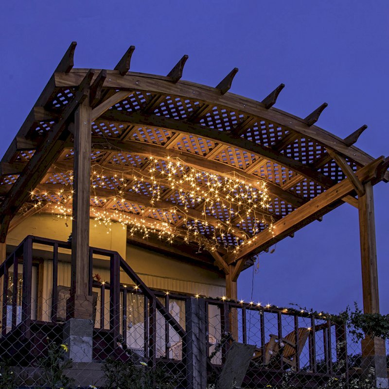 Arched Pergola Kit (Options: 12' L x 16' Arc W, Mosaic Eco-Wood, No Electrical Wiring Trim Kit, 4 Post Anchor Kit for Wood, No Ceiling Fan Bases, No Privacy Panels, No Curtain Rods, 9' Post Height, Transparent Premium Sealant). Free Standing Pergola was altered slightly to place up against house by limiting overhang on house side. Arched Pergola Kit (Options: 12' L x 16' Arc W, Mosaic Eco-Wood, No Electrical Wiring Trim Kit, 4 Post Anchor Kit for Wood, No Ceiling Fan Bases, No Privacy Panels, No Curtain Rods, 9' Post Height, Transparent Premium Sealant). Free Standing Pergola was altered slightly to place up against house by limiting overhang on house side.
