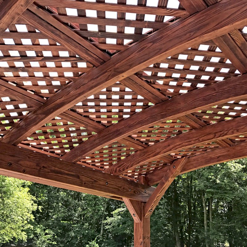 Arched Pergola Kit (Options: 14' L x 10' Arc W, Douglas-fir, No Electrical Wiring Trim Kit, 4 Post Anchor Kit for Concrete, No Ceiling Fan Base, No Privacy Panels, No Curtain Rods, 9' Post Height, Cherry Stain Premium Sealant). Photo Courtesy of D. McAlpine of Holliston, Massachusetts. Arched Pergola Kit (Options: 14' L x 10' Arc W, Douglas-fir, No Electrical Wiring Trim Kit, 4 Post Anchor Kit for Concrete, No Ceiling Fan Base, No Privacy Panels, No Curtain Rods, 9' Post Height, Cherry Stain Premium Sealant). Photo Courtesy of D. McAlpine of Holliston, Massachusetts.