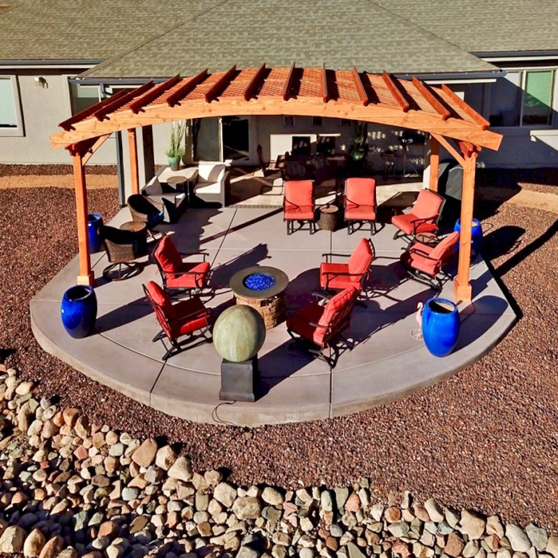 Arched Pergola Kit (Options: 10' L x 24' Arc W, Douglas-fir, No Electrical Wiring Trim Kit, 4 Post Anchor Kit for Concrete, No Ceiling Fan Base, No Privacy Panels, No Curtain Rods, 9' Post Height, Transparent Premium Sealant). Photo Courtesy of Hank Dolan of Prescott, Arizona. Arched Pergola Kit (Options: 10' L x 24' Arc W, Douglas-fir, No Electrical Wiring Trim Kit, 4 Post Anchor Kit for Concrete, No Ceiling Fan Base, No Privacy Panels, No Curtain Rods, 9' Post Height, Transparent Premium Sealant). Photo Courtesy of Hank Dolan of Prescott, Arizona.