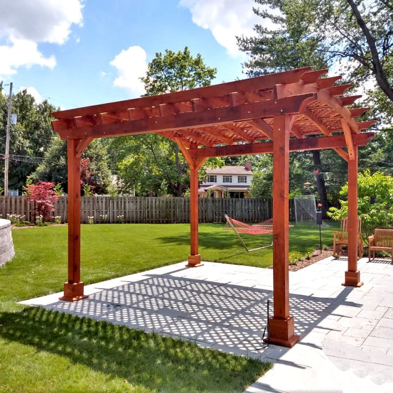 Arched Pergola Kit (Options: 14' L x 14' Arc W, California Redwood, Electrical Wiring Trim Kit for 1 Post, 4 Post Anchor Kit for Concrete, 1 Ceiling Fan Base, No Privacy Panels, No Curtain Rods, 9.5' Post Height, Transparent Premium Sealant). Photo Courtesy of K. Murray of Grand Rapids, Michigan. Arched Pergola Kit (Options: 14' L x 14' Arc W, California Redwood, Electrical Wiring Trim Kit for 1 Post, 4 Post Anchor Kit for Concrete, 1 Ceiling Fan Base, No Privacy Panels, No Curtain Rods, 9.5' Post Height, Transparent Premium Sealant). Photo Courtesy of K. Murray of Grand Rapids, Michigan.
