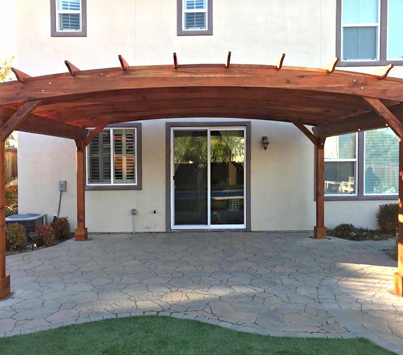 Arched Pergola Kit (Options: 15' L x 20' Arc W, California Redwood, Electrical Wiring Trim Kit for 1 Post, 4 Post Anchor Kit for Concrete, No Ceiling Fan Base, No Privacy Panels, No Curtain Rods, 9' Post Height, Transparent Premium Sealant). Photo Courtesy of Myron Lee of Danville, CA. Arched Pergola Kit (Options: 15' L x 20' Arc W, California Redwood, Electrical Wiring Trim Kit for 1 Post, 4 Post Anchor Kit for Concrete, No Ceiling Fan Base, No Privacy Panels, No Curtain Rods, 9' Post Height, Transparent Premium Sealant). Photo Courtesy of Myron Lee of Danville, CA.