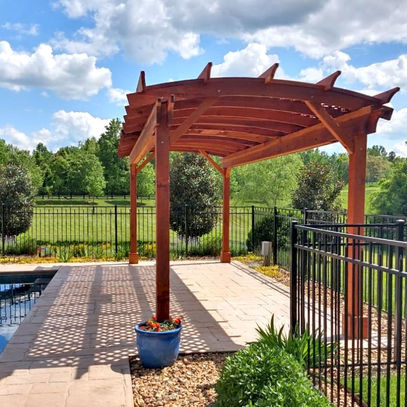 Arched Pergola Kit (Options: 24' L x 10' Arc W, California Redwood, Electrical Wiring Trim Kit for 1 Post, 4 Post Anchor Kit for Concrete, 1 Ceiling Fan Base, No Privacy Panels, No Curtain Rods, 9' Post Height, Transparent Premium Sealant). Photo Courtesy of J. Goldberg of Earlysville, Virginia. Arched Pergola Kit (Options: 24' L x 10' Arc W, California Redwood, Electrical Wiring Trim Kit for 1 Post, 4 Post Anchor Kit for Concrete, 1 Ceiling Fan Base, No Privacy Panels, No Curtain Rods, 9' Post Height, Transparent Premium Sealant). Photo Courtesy of J. Goldberg of Earlysville, Virginia.
