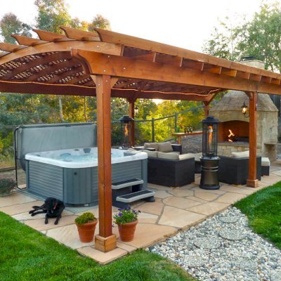 Arched Pergola Kits (Options: 35' L x 18' Arc W, California Redwood, Electrical Wiring Trim for 1 Post, 6-Post Anchor Kit for Stone, No Ceiling Fan Base, No Privacy Panels, No Curtain Rods, 9' Post Height, Transparent Premium Sealant). Photo courtesy of Mark Strider of Danville CA.