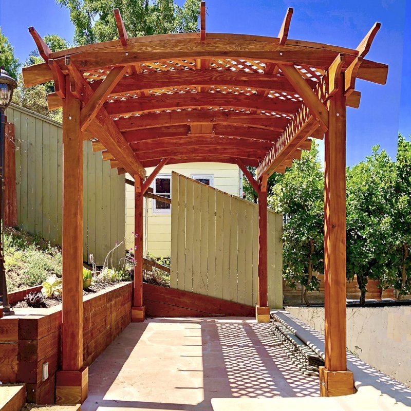 Arched Pergola Kit (Options: 16' L x 10' Arc W, California Redwood, Electrical Wiring Trim Kit for 1 Post, 4 Post Anchor Kit for Concrete, 1 Ceiling Fan Base, No Privacy Panels, No Curtain Rods, 9' Post Height, Transparent Premium Sealant). Photo Courtesy of D. Barreras of South Pasadena, CA. Arched Pergola Kit (Options: 16' L x 10' Arc W, California Redwood, Electrical Wiring Trim Kit for 1 Post, 4 Post Anchor Kit for Concrete, 1 Ceiling Fan Base, No Privacy Panels, No Curtain Rods, 9' Post Height, Transparent Premium Sealant). Photo Courtesy of D. Barreras of South Pasadena, CA.