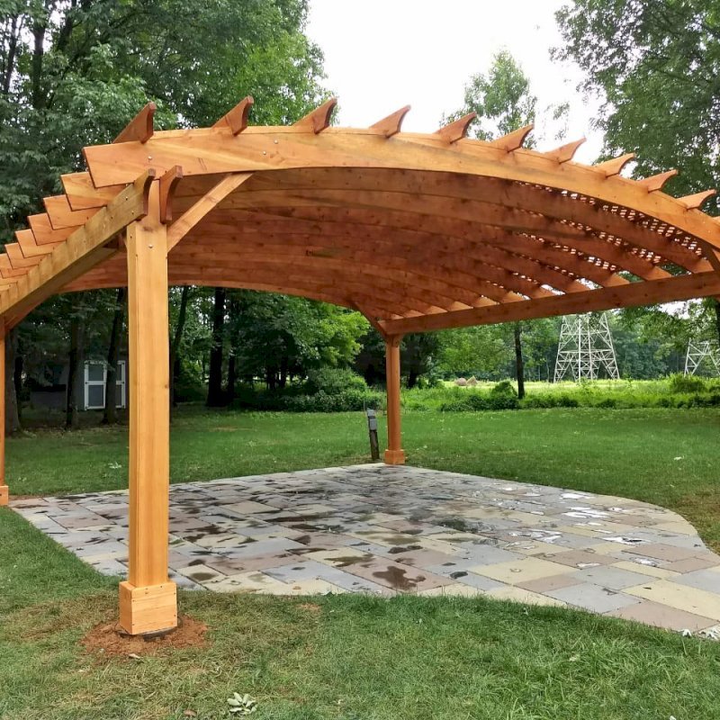 Arched Pergola Kit (Options: 24' L x 24' Arc W, Douglas-fir, Electrical Wiring Trim Kit for 2 Posts, 4 Post Anchor Kit for Gale-Wind, 1 Ceiling Fan Base, No Privacy Panels, No Curtain Rods, 9.5' Post Height, Transparent Premium Sealant). Photo Courtesy of D. Juiliano of Randolph, NJ. Arched Pergola Kit (Options: 24' L x 24' Arc W, Douglas-fir, Electrical Wiring Trim Kit for 2 Posts, 4 Post Anchor Kit for Gale-Wind, 1 Ceiling Fan Base, No Privacy Panels, No Curtain Rods, 9.5' Post Height, Transparent Premium Sealant). Photo Courtesy of D. Juiliano of Randolph, NJ.