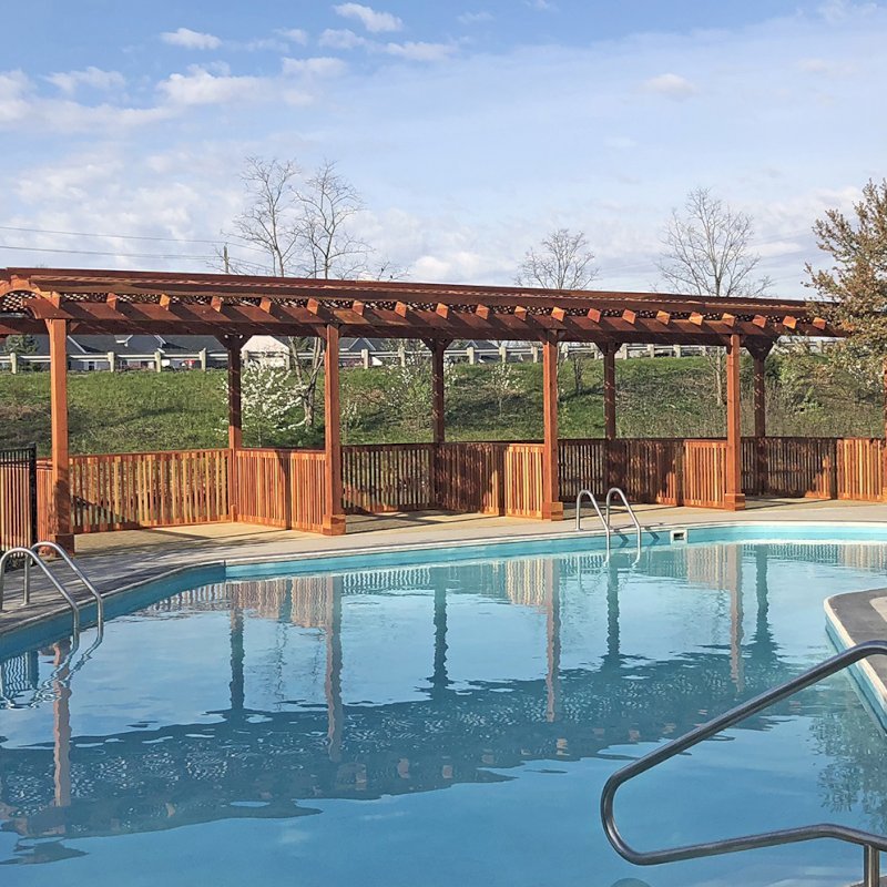 Arched Pergola Kits (Options: 40' L x 14' Arc W, California Redwood, No Electrical Wiring Trim, Arched Roof with Lattice Panels, 10 Post Anchor Kit for Wood, 2 Ceiling Fan Bases, No Curtain Rods, Transparent Premium Sealant). Privacy stalls added by custom request. Photo Courtesy of D. Hatcher of Lewis Center, OH. Arched Pergola Kits (Options: 40' L x 14' Arc W, California Redwood, No Electrical Wiring Trim, Arched Roof with Lattice Panels, 10 Post Anchor Kit for Wood, 2 Ceiling Fan Bases, No Curtain Rods, Transparent Premium Sealant). Privacy stalls added by custom request. Photo Courtesy of D. Hatcher of Lewis Center, OH.