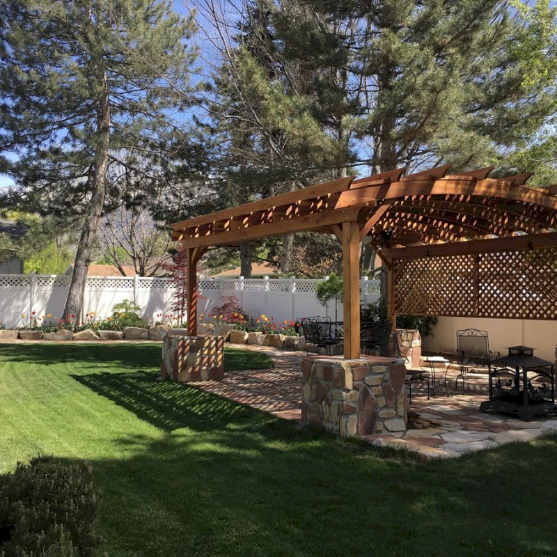 Arched Pergola Kits (Options: 18' L x 14' Arc W, No Privacy Panels, California Redwood, 9.5ft H, Include Electrical Wiring Trim for 2 Posts, Include 4-post Anchoring Kit for Stone, No Post Decorative Trim, Add Ceiling Fan Base, No Curtain Rods, No Retractable Shade Canopy, Transparent Premium Sealant). Participant of Photo Contest 2017. Arched Pergola Kits (Options: 18' L x 14' Arc W, No Privacy Panels, California Redwood, 9.5ft H, Include Electrical Wiring Trim for 2 Posts, Include 4-post Anchoring Kit for Stone, No Post Decorative Trim, Add Ceiling Fan Base, No Curtain Rods, No Retractable Shade Canopy, Transparent Premium Sealant). Participant of Photo Contest 2017.