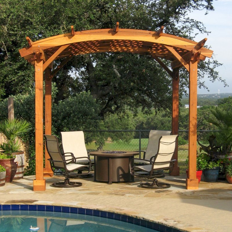 Arched Pergola Kits (Options: 12' x 10' Arc W, California Redwood, Unattached, No Electrical Wiring Trim, Arched Roof with Lattice Panels, 4 Post Anchor Kit for Stone, No Ceiling Fan Base, No Privacy Panels, No Curtain Rods, 9' Post Height, Transparent Premium Sealant). Photo Courtesy of Mr John & Vicky Lewis of Wimberley, TX. Arched Pergola Kits (Options: 12' x 10' Arc W, California Redwood, Unattached, No Electrical Wiring Trim, Arched Roof with Lattice Panels, 4 Post Anchor Kit for Stone, No Ceiling Fan Base, No Privacy Panels, No Curtain Rods, 9' Post Height, Transparent Premium Sealant). Photo Courtesy of Mr John & Vicky Lewis of Wimberley, TX.