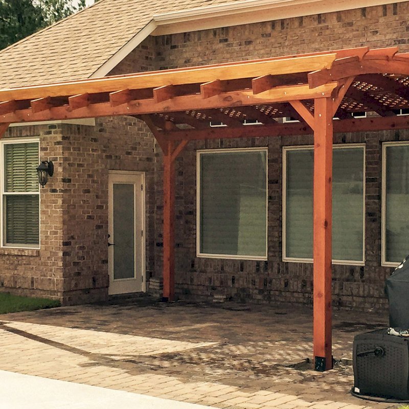 Arched Pergola Kits (Options: 18' L x 15' Arc W, Mature Redwood, Unattached, No Electrical Wiring Trim, Arched Roof with Lattice Panels, 4 Post Anchor Kit for Stone, No Ceiling Fan Base, No Privacy Panels, No Curtain Rods, 10' Post Height, Transparent Premium Sealant). Photo Courtesy of Andrew Snoddy of Little River, South Carolina. Arched Pergola Kits (Options: 18' L x 15' Arc W, Mature Redwood, Unattached, No Electrical Wiring Trim, Arched Roof with Lattice Panels, 4 Post Anchor Kit for Stone, No Ceiling Fan Base, No Privacy Panels, No Curtain Rods, 10' Post Height, Transparent Premium Sealant). Photo Courtesy of Andrew Snoddy of Little River, South Carolina.