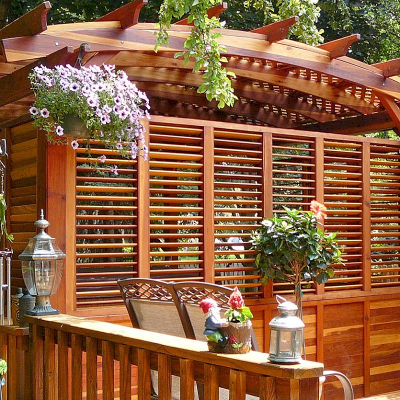 Arched Pergola Kits (Options: 16' L x 14' Arc W, With Wall Panel Louver Style, California Redwood, Unattached, No Electrical Wiring Trim, Arched Roof with Lattice Panels, 4 Post Anchor Kit for Stone, No Ceiling Fan Base, Privacy Panels, No Curtain Rods, 9' Post Height, Transparent Premium Sealant). Photo Courtesy of George Jackson of Commerce Township, Michigan. Arched Pergola Kits (Options: 16' L x 14' Arc W, With Wall Panel Louver Style, California Redwood, Unattached, No Electrical Wiring Trim, Arched Roof with Lattice Panels, 4 Post Anchor Kit for Stone, No Ceiling Fan Base, Privacy Panels, No Curtain Rods, 9' Post Height, Transparent Premium Sealant). Photo Courtesy of George Jackson of Commerce Township, Michigan.