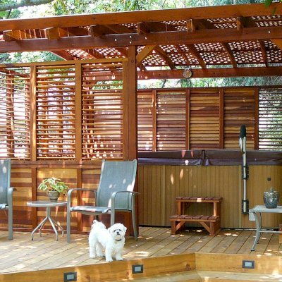 Arched Pergola Kits (Options: 16' L x 14' Arc W, With Wall Panel Louver Style, California Redwood, No Electrical Wiring Trim, 4-Post Anchor Kit for Stone, No Ceiling Fan Base, Privacy Panels, No Curtain Rods, 9' Post Height, Transparent Premium Sealant). Photo Courtesy of George Jackson of Commerce Township,  Michigan.