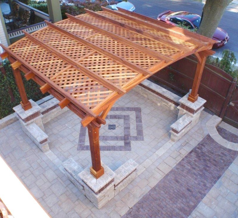 Arched Pergola Kits (Options: 12' L x 14' Arc W, California Redwood, Unattached, No Electrical Witing Trim, Arched Roof with Lattice Panels, 4 Post Anchor Kit for Stone, No Ceiling Fan Base, No Privacy Panels, No Curtain Rods, 9' Post Height, Transparent Premium Sealant). Photo Courtesy of Mr. Gary Benson of Depew, NY. Brick work done around posts after installation. Arched Pergola Kits (Options: 12' L x 14' Arc W, California Redwood, Unattached, No Electrical Witing Trim, Arched Roof with Lattice Panels, 4 Post Anchor Kit for Stone, No Ceiling Fan Base, No Privacy Panels, No Curtain Rods, 9' Post Height, Transparent Premium Sealant). Photo Courtesy of Mr. Gary Benson of Depew, NY. Brick work done around posts after installation.