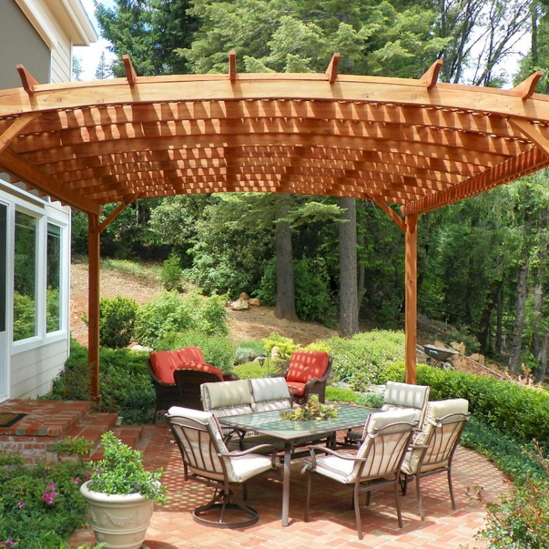 Arched Pergola Kits (Options: 20' L x 18' Arc W, Mature Redwood, Unattached, No Electrical Wiring Trim, Arched Roof with Lattice Panels, 4 Post Anchor Kit for Stone, No ceiling Fan Base, No Privacy Panels, No Curtain Rods, 10' Post Height, Transparent Premium Sealant). Photo Courtesy of Edward G. of Nevada City, CA. Arched Pergola Kits (Options: 20' L x 18' Arc W, Mature Redwood, Unattached, No Electrical Wiring Trim, Arched Roof with Lattice Panels, 4 Post Anchor Kit for Stone, No ceiling Fan Base, No Privacy Panels, No Curtain Rods, 10' Post Height, Transparent Premium Sealant). Photo Courtesy of Edward G. of Nevada City, CA.