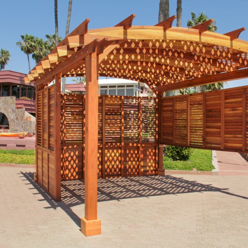 Arched Pergola Kits (Options: 16' L x 14' Arc W, California Redwood, Unattached, No Electrical Wiring Trim, Arched Roof with Lattice Panels, 4 Post Anchor Kit for Stone, No Ceiling Fan Base, Privacy Panels & Louvers, No Curtain Rods, 9' Post Height, Transparent Premium Sealant). Photo Courtesy of George Jackson of Commerce Township, Michigan. Arched Pergola Kits (Options: 16' L x 14' Arc W, California Redwood, Unattached, No Electrical Wiring Trim, Arched Roof with Lattice Panels, 4 Post Anchor Kit for Stone, No Ceiling Fan Base, Privacy Panels & Louvers, No Curtain Rods, 9' Post Height, Transparent Premium Sealant). Photo Courtesy of George Jackson of Commerce Township, Michigan.