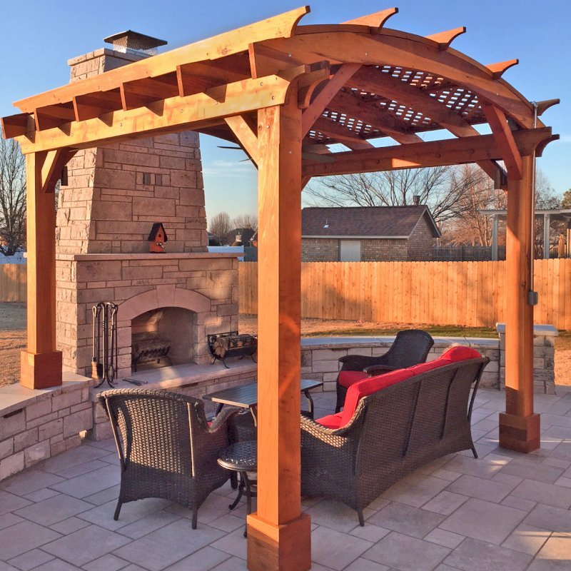 Arched Pergola Kit (Options: 12' L x 12' Arc W, California Redwood, No Electrical Wiring Trim, Arched Roof with Lattice Panels, 4 Post Anchor Kit for Concrete, 1 Ceiling Fan Base, No Privacy Panels, No Curtain Rods, Transparent Premium Sealant, 2 Posts Wrapped in Masonry, 8 x 8 Posts by Custom Request). Photo Courtesy of S. Hunter of Fort Smith, AR. Arched Pergola Kit (Options: 12' L x 12' Arc W, California Redwood, No Electrical Wiring Trim, Arched Roof with Lattice Panels, 4 Post Anchor Kit for Concrete, 1 Ceiling Fan Base, No Privacy Panels, No Curtain Rods, Transparent Premium Sealant, 2 Posts Wrapped in Masonry, 8 x 8 Posts by Custom Request). Photo Courtesy of S. Hunter of Fort Smith, AR.