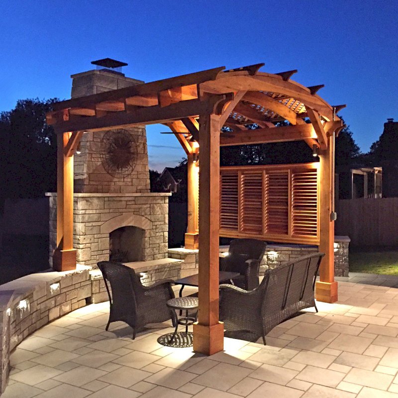 Arched Pergola Kit (Options: 12' L x 12' Arc W, California Redwood, No Electrical Wiring Trim, Arched Roof with Lattice Panels, 4 Post Anchor Kit for Concrete, 1 Ceiling Fan Base, 1 Louver Privacy Panel, No Curtain Rods, Transparent Premium Sealant, 2 Posts Wrapped in Masonry, 8 x 8 Posts by Custom Request). Photo Courtesy of S. Hunter of Fort Smith, AR. Arched Pergola Kit (Options: 12' L x 12' Arc W, California Redwood, No Electrical Wiring Trim, Arched Roof with Lattice Panels, 4 Post Anchor Kit for Concrete, 1 Ceiling Fan Base, 1 Louver Privacy Panel, No Curtain Rods, Transparent Premium Sealant, 2 Posts Wrapped in Masonry, 8 x 8 Posts by Custom Request). Photo Courtesy of S. Hunter of Fort Smith, AR.