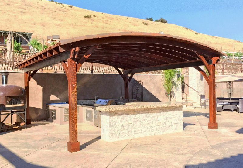 Arched Thick Timber Pavilion (Options: 24' L x 22' Arc W, California Redwood, No Electrical Wiring Trim, 4 Post Anchor Kit for Concrete, No Ceiling Fan Base, No Privacy Panel, No Curtain Rods, 10ft H, Transparent Premium Sealant). Arched Thick Timber Pavilion (Options: 24' L x 22' Arc W, California Redwood, No Electrical Wiring Trim, 4 Post Anchor Kit for Concrete, No Ceiling Fan Base, No Privacy Panel, No Curtain Rods, 10ft H, Transparent Premium Sealant).