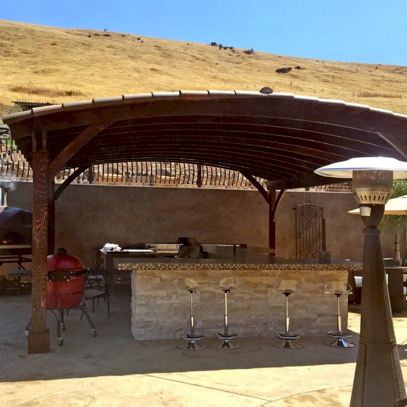 Arched Thick Timber Pavilion (Options: 24' L x 22' Arc W, California Redwood, No Electrical Wiring Trim, 4 Post Anchor Kit for Concrete, No Ceiling Fan Base, No Privacy Panel, No Curtain Rods, 10ft H, Transparent Premium Sealant). Arched Thick Timber Pavilion (Options: 24' L x 22' Arc W, California Redwood, No Electrical Wiring Trim, 4 Post Anchor Kit for Concrete, No Ceiling Fan Base, No Privacy Panel, No Curtain Rods, 10ft H, Transparent Premium Sealant).