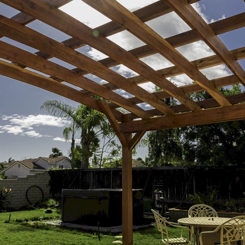 Attached Arched Pergola Kits (Options: 20' L x 15' W, California Redwood, No Electrical Wiring Trim, Arched Roof without Lattice Panels, 2-Post Anchor Kit for Concrete, No Ceiling Fan Base, No Privacy Panels, No Curtain Rods, 10' Post Height, Transparent Premium Sealant). Photo Courtesy of C. Thompson of Corona, CA. Attached Arched Pergola Kits (Options: 20' L x 15' W, California Redwood, No Electrical Wiring Trim, Arched Roof without Lattice Panels, 2-Post Anchor Kit for Concrete, No Ceiling Fan Base, No Privacy Panels, No Curtain Rods, 10' Post Height, Transparent Premium Sealant). Photo Courtesy of C. Thompson of Corona, CA.