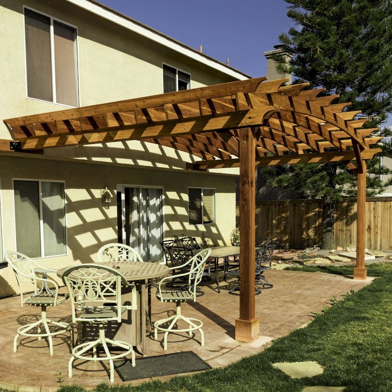 Attached Arched Pergola Kits (Options: 20' L x 15' W, California Redwood, No Electrical Wiring Trim, Arched Roof without Lattice Panels, 2-Post Anchor Kit for Concrete, No Ceiling Fan Base, No Privacy Panels, No Curtain Rods, 10' Post Height, Transparent Premium Sealant). Photo Courtesy of C. Thompson of Corona, CA. Attached Arched Pergola Kits (Options: 20' L x 15' W, California Redwood, No Electrical Wiring Trim, Arched Roof without Lattice Panels, 2-Post Anchor Kit for Concrete, No Ceiling Fan Base, No Privacy Panels, No Curtain Rods, 10' Post Height, Transparent Premium Sealant). Photo Courtesy of C. Thompson of Corona, CA.