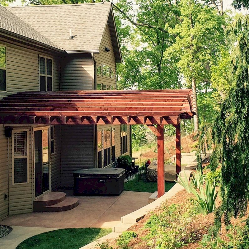 Attached Arched Pergola Kits (Options: 20' L x 26' W, Douglas-fir, No Electrical Wiring Trim, Rafters at 18" and Slats at 18", Widthwise Roof Support Timbers, 2-Post Anchor Kit for Concrete, Ceiling Fan Base, No Privacy Panels, No Curtain Rods, 11' Post Height, Coffee-Stain Premium Sealant). Photo Courtesy of Susanne Stephens of Eureka, Missouri. Attached Arched Pergola Kits (Options: 20' L x 26' W, Douglas-fir, No Electrical Wiring Trim, Rafters at 18" and Slats at 18", Widthwise Roof Support Timbers, 2-Post Anchor Kit for Concrete, Ceiling Fan Base, No Privacy Panels, No Curtain Rods, 11' Post Height, Coffee-Stain Premium Sealant). Photo Courtesy of Susanne Stephens of Eureka, Missouri.