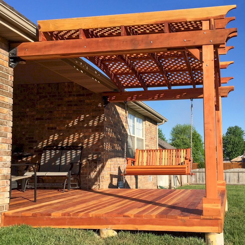 Attached Arched Pergola Kits (Options: 10' x 10', California Redwood, No Electrical Wiring Trim, with Lattice Panels, 2-Post Anchor Kit for Concrete, No Ceiling Fan Base, No Privacy Options, No Curtain Rods, 9ft H, Transparent Premium Sealant) with Deck and Bench Swing by Custom Request. Photo Courtesy of Telory of A. of Springfield, MO.. Attached Arched Pergola Kits (Options: 10' x 10', California Redwood, No Electrical Wiring Trim, with Lattice Panels, 2-Post Anchor Kit for Concrete, No Ceiling Fan Base, No Privacy Options, No Curtain Rods, 9ft H, Transparent Premium Sealant) with Deck and Bench Swing by Custom Request. Photo Courtesy of Telory of A. of Springfield, MO..
