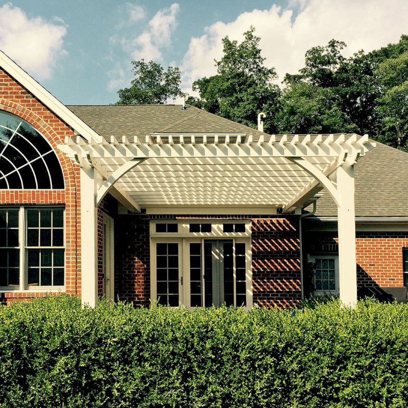 Attached Garden Pergolas (Options: 14' L x 14' W, California Redwood, No Electrical Wiring Trim, 2-Post Anchor Kit for Gale-Wind, Open Roof with Slats at 12", Rafters at 18", 2x4's Slats and 2x8's Rafters by Custom Request, No Post Decorative Trims, Custom Paint). Photo Courtesy of Walt and Mayra Talunas of West Chester, Pennsylvania. Attached Garden Pergolas (Options: 14' L x 14' W, California Redwood, No Electrical Wiring Trim, 2-Post Anchor Kit for Gale-Wind, Open Roof with Slats at 12", Rafters at 18", 2x4's Slats and 2x8's Rafters by Custom Request, No Post Decorative Trims, Custom Paint). Photo Courtesy of Walt and Mayra Talunas of West Chester, Pennsylvania.