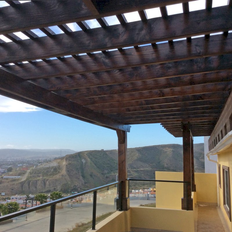 Attached Garden Pergolas (Options: 16' x 5' & 25' x 9', Attached to Wall by Support Side, Douglas-fir, No Electrical Wiring Trim, Posts Attached Atop this Load Bearing Wall, Open Roof with Slats at 12", Coffee-Stain Premium Sealant). Photo Courtesy of A. Gonzalez of Ensenada, B.C. Attached Garden Pergolas (Options: 16' x 5' & 25' x 9', Attached to Wall by Support Side, Douglas-fir, No Electrical Wiring Trim, Posts Attached Atop this Load Bearing Wall, Open Roof with Slats at 12", Coffee-Stain Premium Sealant). Photo Courtesy of A. Gonzalez of Ensenada, B.C.