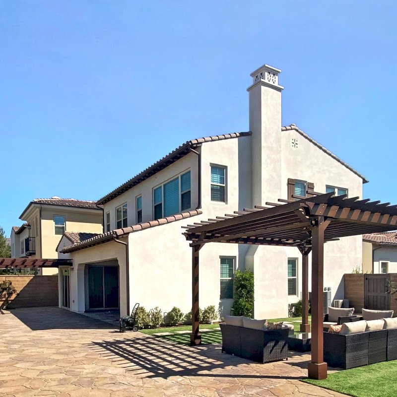 Attached Garden Pergolas (Options: 20' x 16', Douglas-fir, Open Roof with Slats at 18", Rafters at 18", 2-Post Anchor Kit for Concrete, 1 Ceiling Fan Base, Custom Paint). Photo Also Shows a Traditional Garden Pergola. Photo Courtesy of M. Ibrahim Elfar of Irvine, California. Attached Garden Pergolas (Options: 20' x 16', Douglas-fir, Open Roof with Slats at 18", Rafters at 18", 2-Post Anchor Kit for Concrete, 1 Ceiling Fan Base, Custom Paint). Photo Also Shows a Traditional Garden Pergola. Photo Courtesy of M. Ibrahim Elfar of Irvine, California.