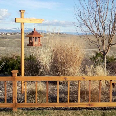 Aviary Oasis Bird Feeders (Options: Old-Growth Redwood, XW Roof Eaves, Transparent Premium Sealant).  Photo Courtesy of Mr. Bruce Davis of Starr, Idaho.