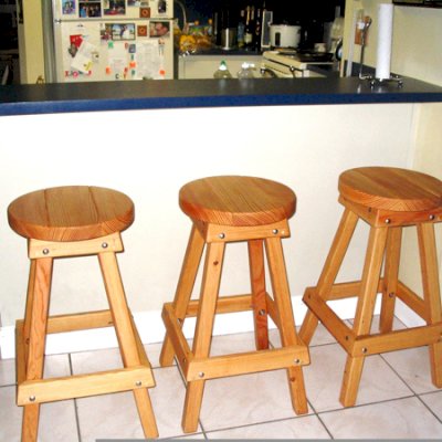 3 Backless Wood Bar Stool (Options: 36" H, Douglas-fir, Round 15" Diameter Seat, 4 Legs, No Engraving, Transparent Premium Sealant). Photo Courtesy of Norma and Pete Zayas of Miami, Florida.