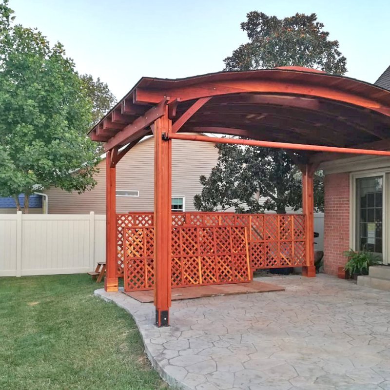 Backyard Pavilion Kits (Options: 12' L x 18' Arc W, California Redwood, 1 Electrical Wiring Trim, 4 Post Anchor Kit for Gale-Wind, No Ceiling Fan Base, 2 Privacy Panels, 1 Curtain Rod, 9.5 ft Post Height, Transparent Premium Sealant). Final Privacy Panel Install Pending. Photo Courtesy of C Liebo of Newburgh, Indiana. Backyard Pavilion Kits (Options: 12' L x 18' Arc W, California Redwood, 1 Electrical Wiring Trim, 4 Post Anchor Kit for Gale-Wind, No Ceiling Fan Base, 2 Privacy Panels, 1 Curtain Rod, 9.5 ft Post Height, Transparent Premium Sealant). Final Privacy Panel Install Pending. Photo Courtesy of C Liebo of Newburgh, Indiana.